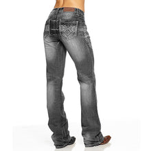 Load image into Gallery viewer, Embroidered and distressed bootcut jeans with beading
