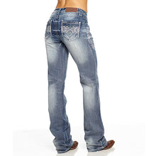 Load image into Gallery viewer, Embroidered and distressed bootcut jeans with beading