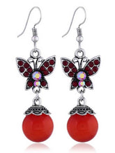 Load image into Gallery viewer, Pendientes mariposa de cristal bohemio

