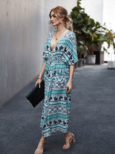 Load image into Gallery viewer, Vestidos sueltos con cuello en V y estampado floral bohemio
