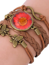 Load image into Gallery viewer, Woven daisy leather bracelet in vintage epoxy resin
