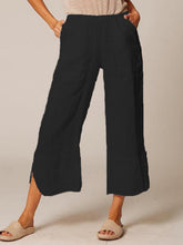 Load image into Gallery viewer, Mujer bolsillos de parche cintura elástica aberturas laterales pantalones casuales de algodón y lino
