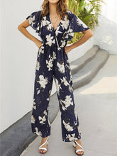 Load image into Gallery viewer, Macacão folgado com estampa floral e cintura alta com decote em V

