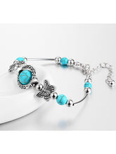 Load image into Gallery viewer, Pulseira feminina turquesa feita à mão com borboleta
