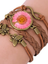 Load image into Gallery viewer, Woven daisy leather bracelet in vintage epoxy resin
