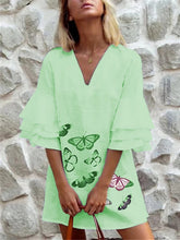 Load image into Gallery viewer, Short V-neck dress in cotton and linen printed with butterflies
