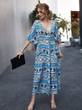 Load image into Gallery viewer, Vestidos sueltos con cuello en V y estampado floral bohemio
