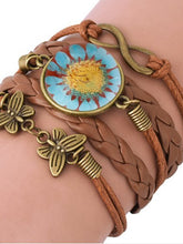 Load image into Gallery viewer, Woven daisy leather bracelet in vintage epoxy resin
